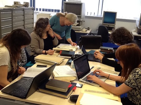 The #DoingHistory Team and Becky Proctor researching in the Cambridgeshire Collection